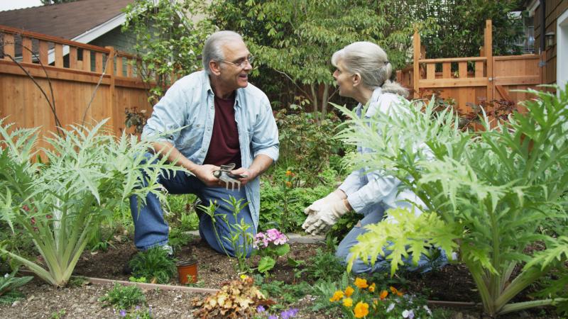 man and women gardening 